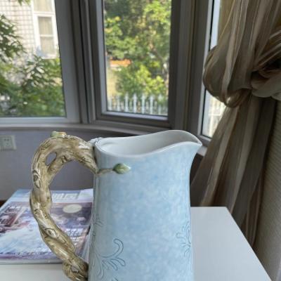 BÌNH HOA BẰNG SỨ ĐẮP NỔI CHIM HOA CÓ TAY CẦM